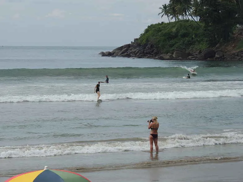 Surfing at Dewata Beach
